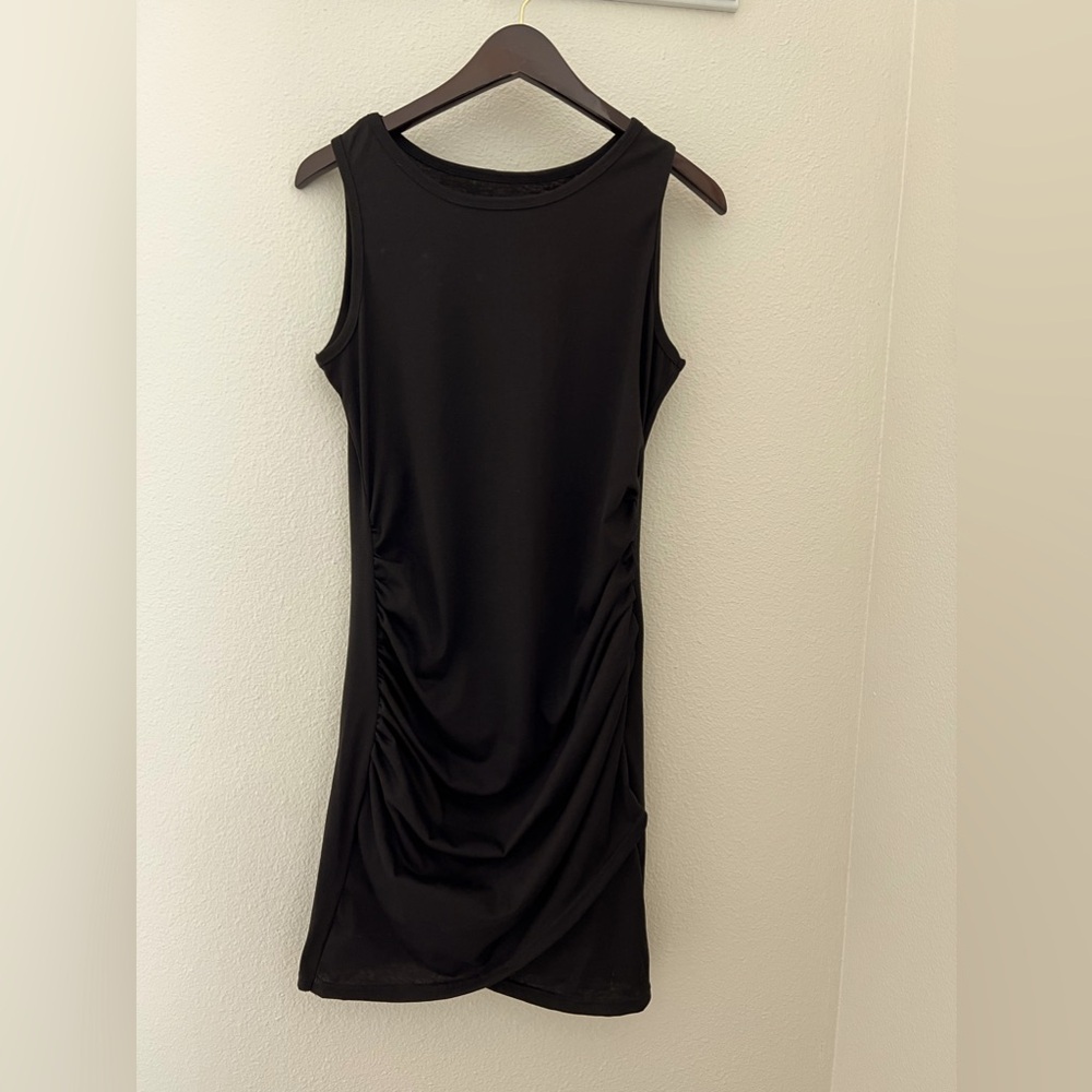 LBD-above knee, ruched siding. Size medium